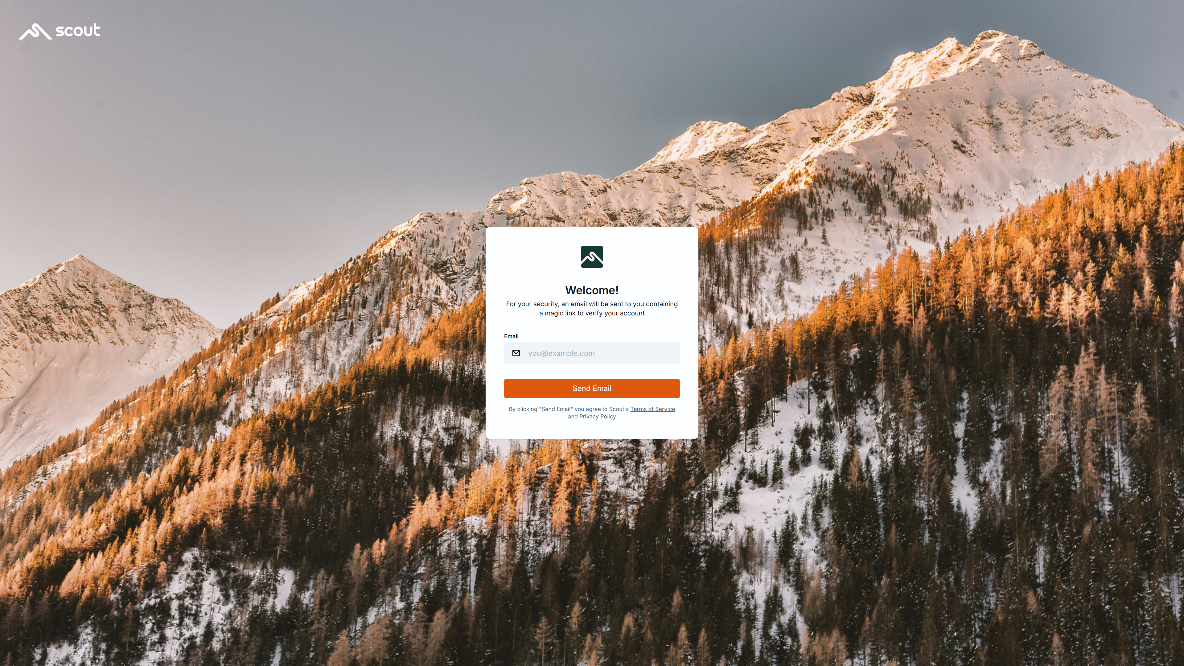 Login page with a centered form to enter email and send a login link, over a background of snowy mountains.